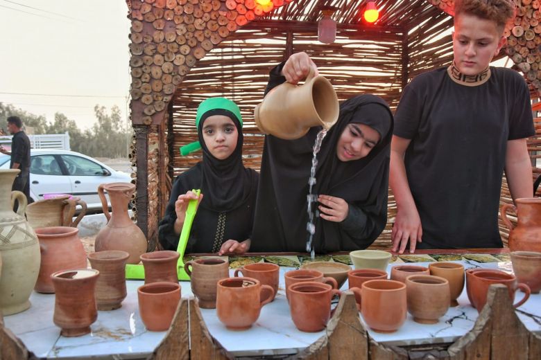 ايادي صغيرة وقلوب كبيرة تتنافس في حب الحسين (ع)